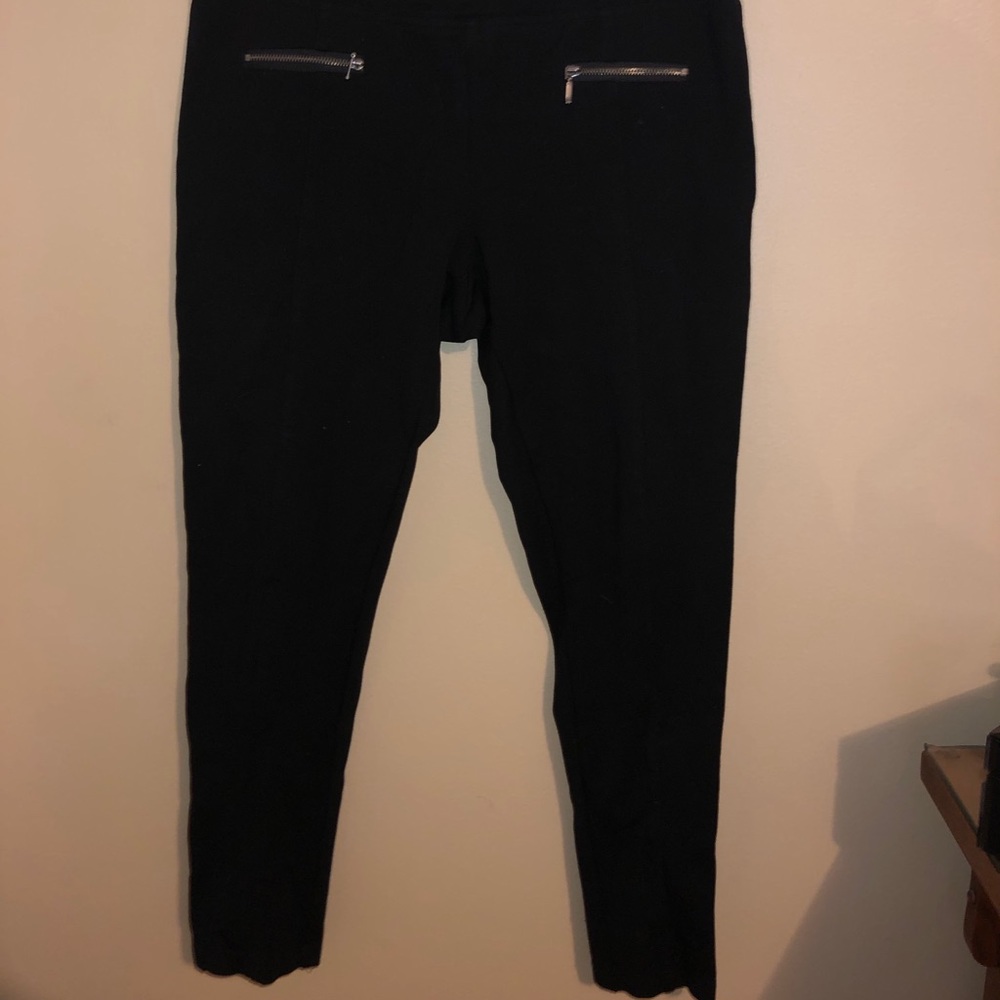The best work pants! Little zippers in the front.